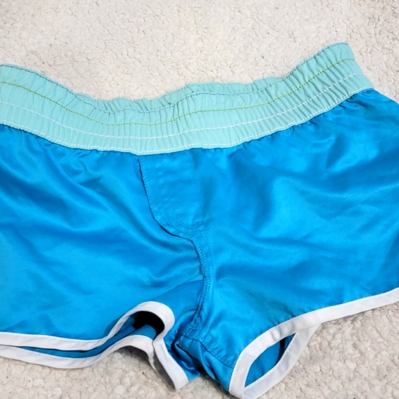 ROXY Beach shorties. Size Small blue, green and white with a zip mesh pocket 💙 - Picture 6 of 7